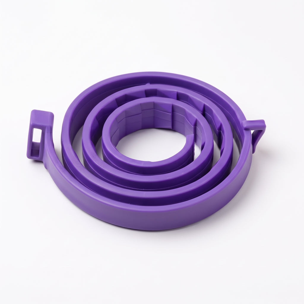 A purple coiled plastic strap or band with small side tabs, photographed on a clean white background.