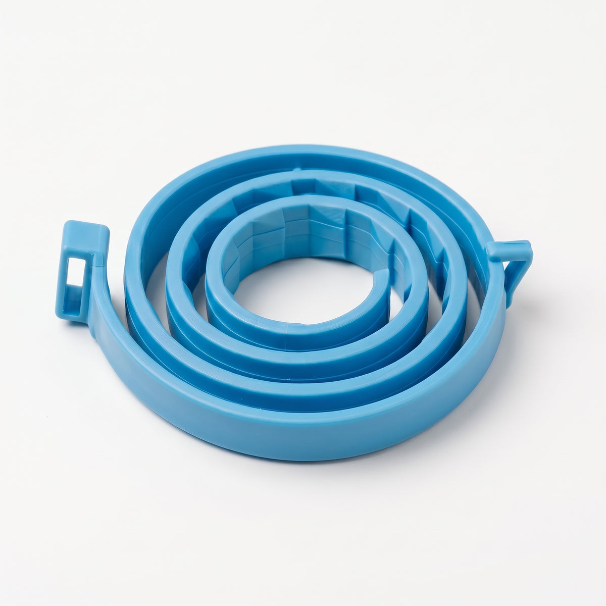 A coiled blue collar with small side tabs, photographed on a clean white background.